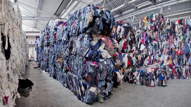 piles of clothing, waste, fast fashion, unsold clothing